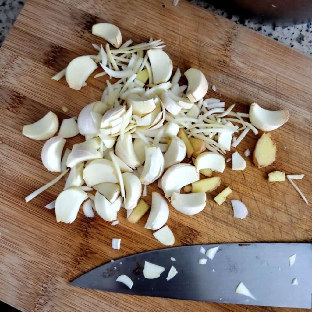 Floor-view garlic-ginger chaos.